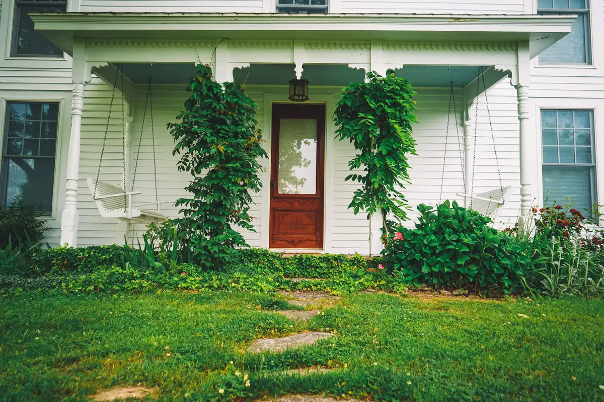 Architectural inspiration: a traditional porch entry with window and door trim